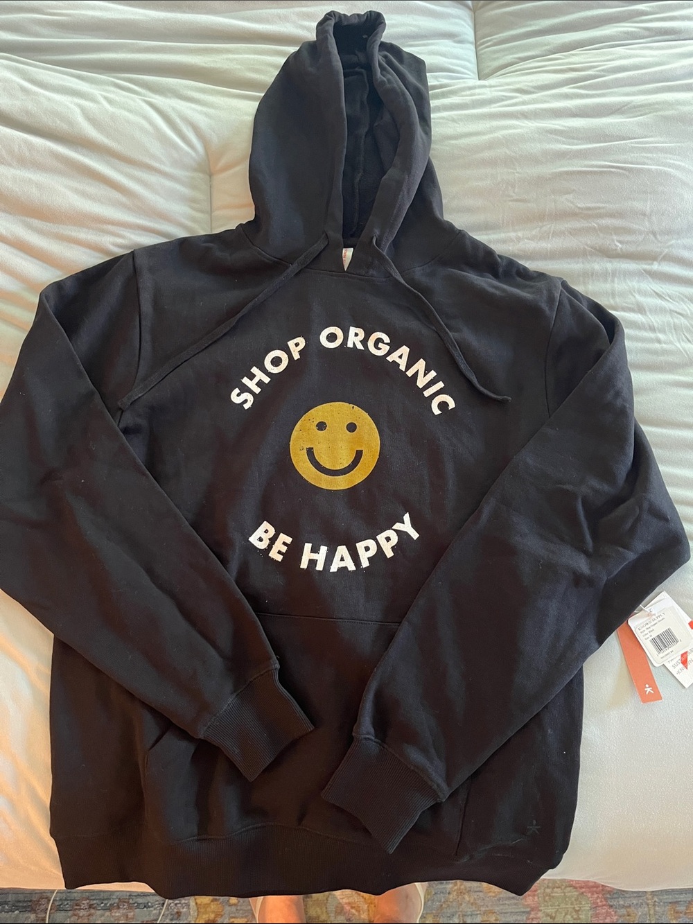 Known Supply Black Hoodie with Yellow Smiley "Shop Organic Be Happy"